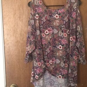 An Absolutely Famous open shoulder shirt